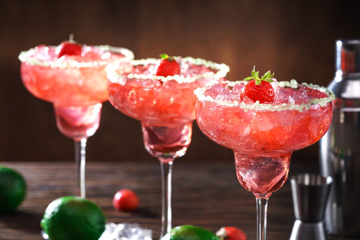 Freshly made strawberry margaritas are ready to be served.